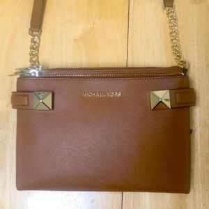 Brand new tan colored MK side body purse with gold hardware and strap